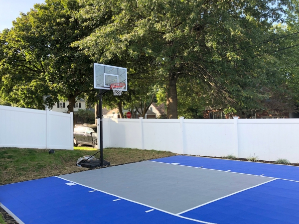 Bright blue and gray half court for basketball