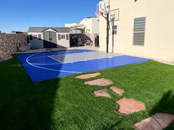 Bright blue and gray small basketball court