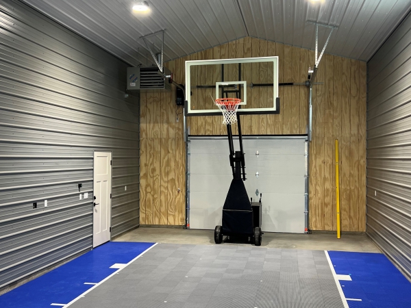 Indoor basketball court with blue and gray colors
