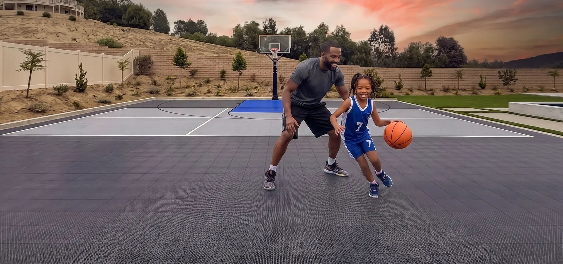 memorial-day-sale-banner Father and daughter play basketball on their backyard court