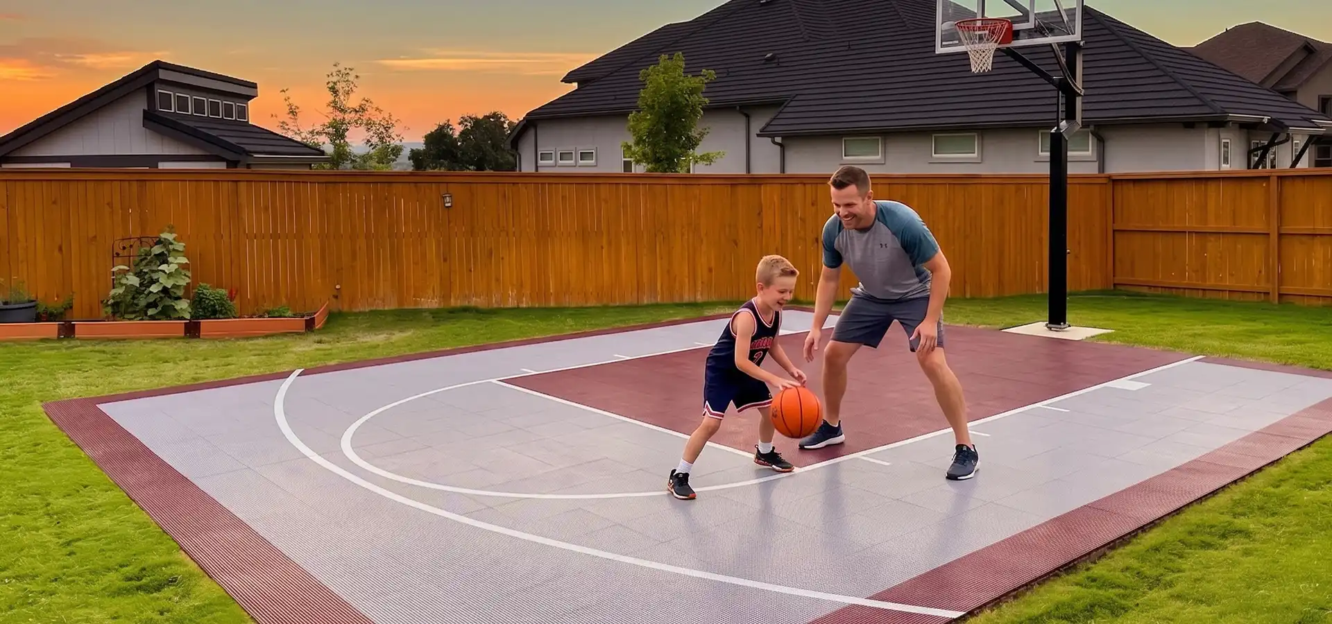 Father and son play basketball on their backyard court
